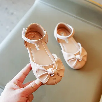 Пролетно-летни сандали, нова корейска версия полусандалий, обувки принцеса от изкуствена кожа с лък за момичета, модни и ежедневни детски обувки